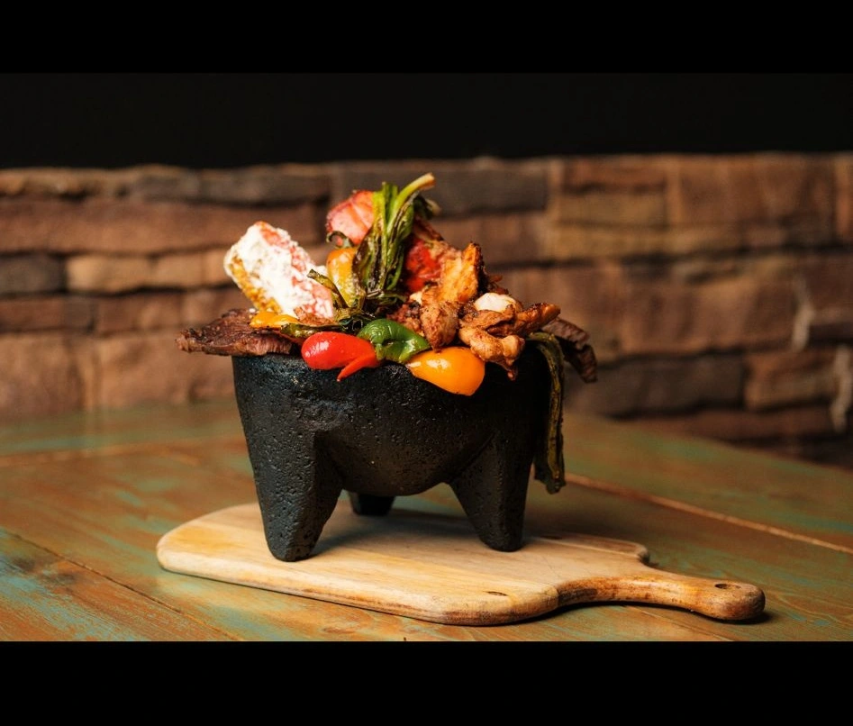 Delicious Original Molcajete Flameado at The Three Amigos in Edmonton, AB